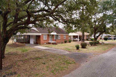 Charming 3-bedroom, 1-bath brick ranch located in the heart of - photo 2