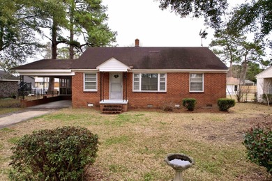 Charming 3-bedroom, 1-bath brick ranch located in the heart of - photo 3