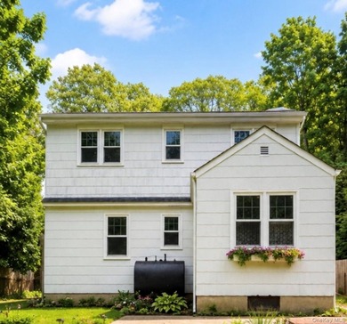 Located on a quiet, tree-lined residential street in the heart - photo 2