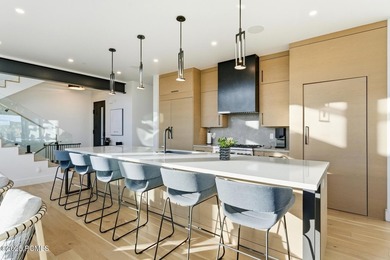 This six-bedroom residence features an open, thoughtfully - photo 6