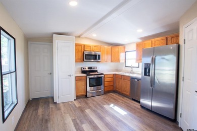 Welcome to this beautifully updated 2-bedroom, 2-bath home - photo 1