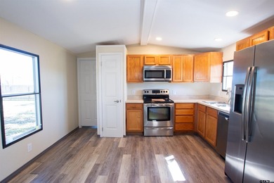 Welcome to this beautifully updated 2-bedroom, 2-bath home - photo 2