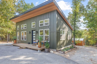 TWO homes for the price of ONE! The main home, custom built in