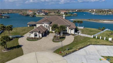 Located on the tranquil shores of the gated community of The - photo 2