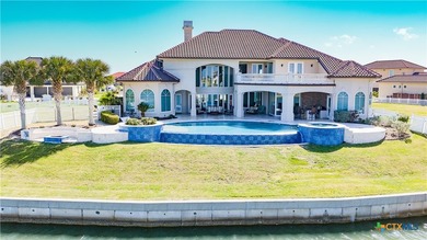 Located on the tranquil shores of the gated community of The - photo 3