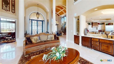 Located on the tranquil shores of the gated community of The - photo 6