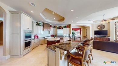 Located on the tranquil shores of the gated community of The - photo 10