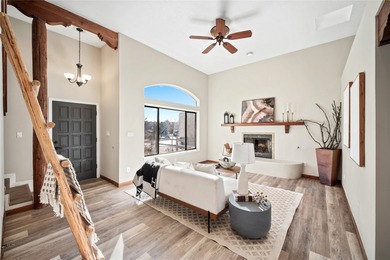 Set within a peaceful gated community, this Santa Fe home blends
