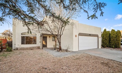 Set within a peaceful gated community, this Santa Fe home blends