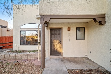 Set within a peaceful gated community, this Santa Fe home blends