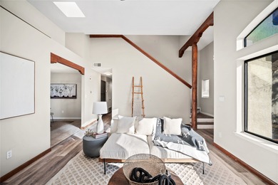 Set within a peaceful gated community, this Santa Fe home blends