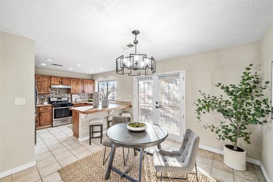 Set within a peaceful gated community, this Santa Fe home blends