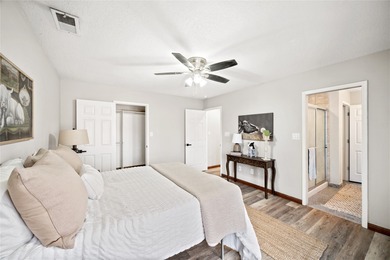 Set within a peaceful gated community, this Santa Fe home blends