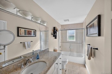 Here, at 266 Clinton Avenue, East Patchogue; a coastal haven - photo 22