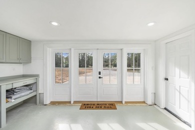 Explore the extensive possibilities at 9648 Bone Bluff Drive, a - photo 7
