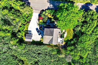 Here, at 266 Clinton Avenue, East Patchogue; a coastal haven - photo 27