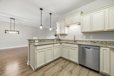 This well-maintained condo in Queens Harbor offers comfort