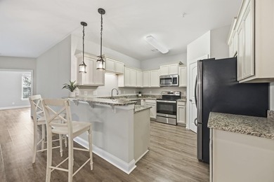 This well-maintained condo in Queens Harbor offers comfort