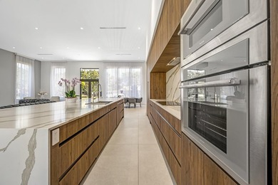New contemporary estate featuring over 4,500 sf. indoor and - photo 10