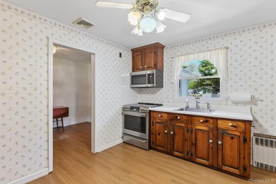 Get ready for summer in this lovely three bedroom ranch in the - photo 12