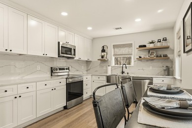 Welcome to this stunning lakefront home in the gated community - photo 15