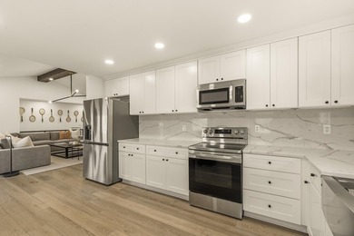 Welcome to this stunning lakefront home in the gated community - photo 16