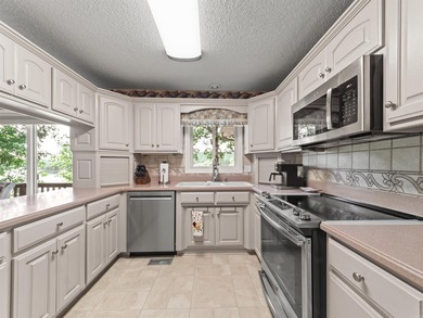 126' of PANORAMIC WATERFRONT! This meticulously maintained Lake - photo 30
