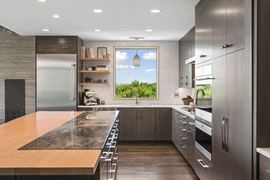 Recently reimagined and thoughtfully renovated throughout, this - photo 18