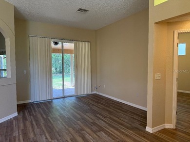 This three-bedroom, two-bathroom, two-car garage, and screened - photo 22