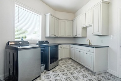 Set on approximately four private, tree-lined acres in the - photo 22