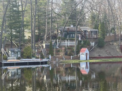 Welcome to your Up North escape on Sutherland Lake. With 90 feet - photo 1