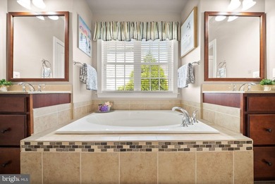 Situated on a premier lot within the prestigious, gated golf - photo 32