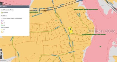 This 1.02 acre wooded lot has a rear lagoon view and is located - photo 4