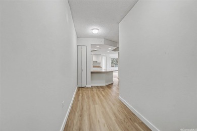BRAND NEW LISTING! NEW FLOORING! NEW PAINT! Low floor -Ewa/Mauka