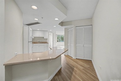 BRAND NEW LISTING! NEW FLOORING! NEW PAINT! Low floor -Ewa/Mauka