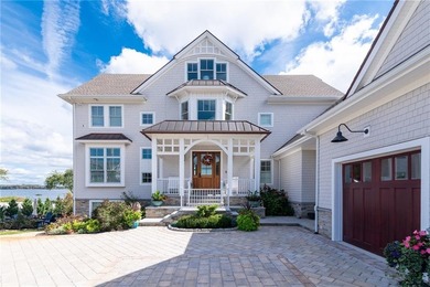 Welcome to *Bridge View* a stunning, shingle-style residence