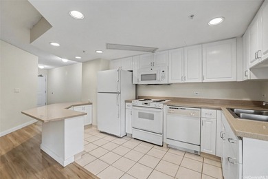 BRAND NEW LISTING! NEW FLOORING! NEW PAINT! Low floor -Ewa/Mauka