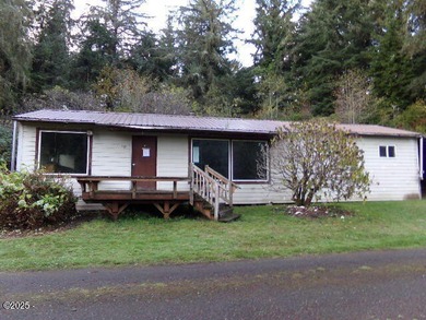2 bedroom, 1 bathroom home on .88 acres. Close to Waldport Bay - photo 1