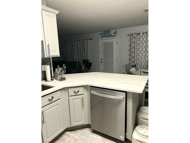 **Sellers to include 1 year home warranty** Lovely three bedroom - photo 5