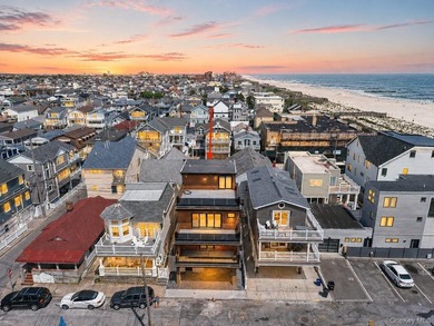 Welcome to elevated coastal living in this newly constructed - photo 1