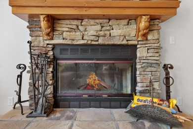 Discover the warmth and charm of this lakefront retreat in the - photo 13