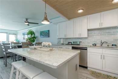 Perched on the penthouse level, 608 showcases elegant crown