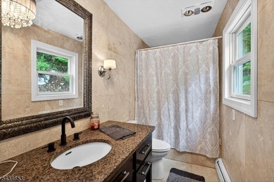 GORGEOUS inside and out! Spectacular views of Lake Mohawk from - photo 18