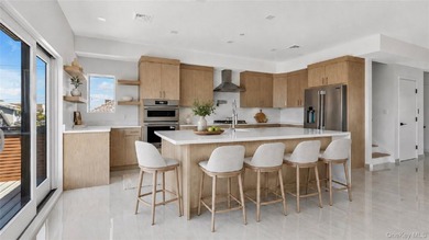 Welcome to elevated coastal living in this newly constructed - photo 8