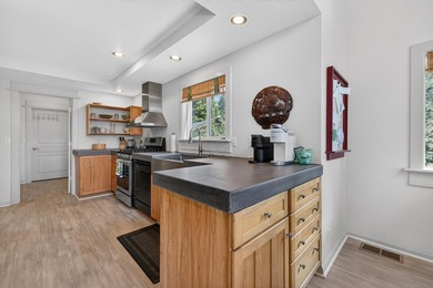 Discover the warmth and charm of this lakefront retreat in the - photo 20
