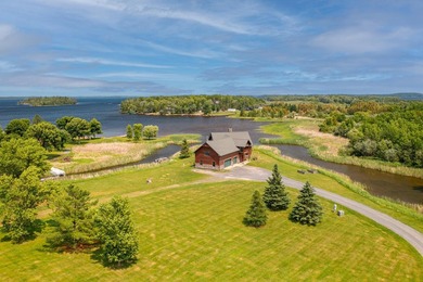 Experience exceptional lakefront living on beautiful Rainy Lake! - photo 1
