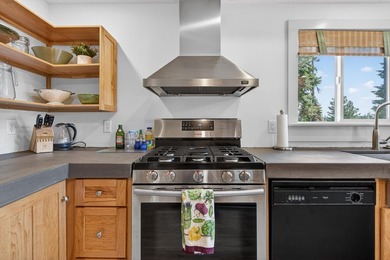 Discover the warmth and charm of this lakefront retreat in the - photo 23