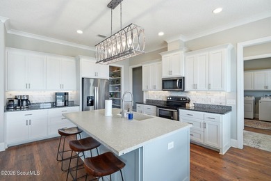 Experience exceptional coastal living at this stunning - photo 30