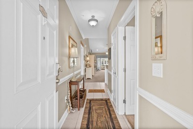 Beautifully updated and meticulously maintained, this top floor