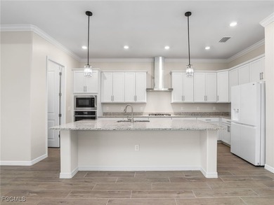 Live where others vacation in this Calusa model, overlooking the - photo 10